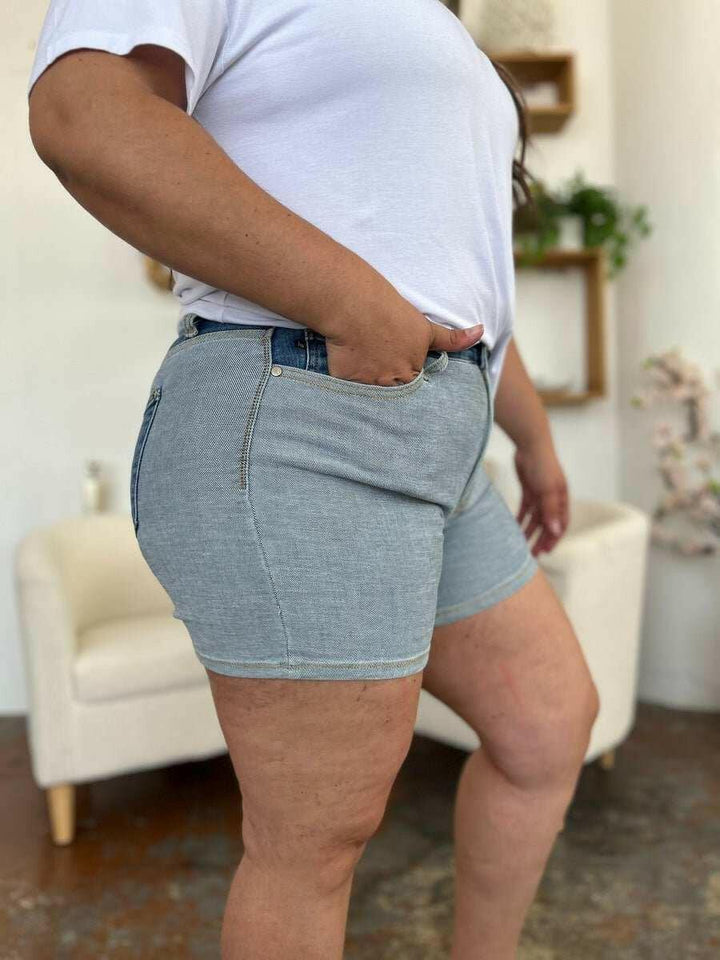 Judy Blue Color Block Denim ShortsStep into summer with an exclusive touch of modern flair featuring the Judy Blue Color Block Denim Shorts. Designed for trendsetters who demand both style and comforJean ShortsJudy Blue Color Block Denim Shorts