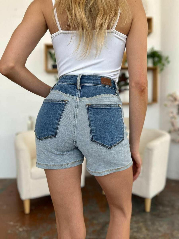 Judy Blue Color Block Denim ShortsStep into summer with an exclusive touch of modern flair featuring the Judy Blue Color Block Denim Shorts. Designed for trendsetters who demand both style and comforJean ShortsJudy Blue Color Block Denim Shorts