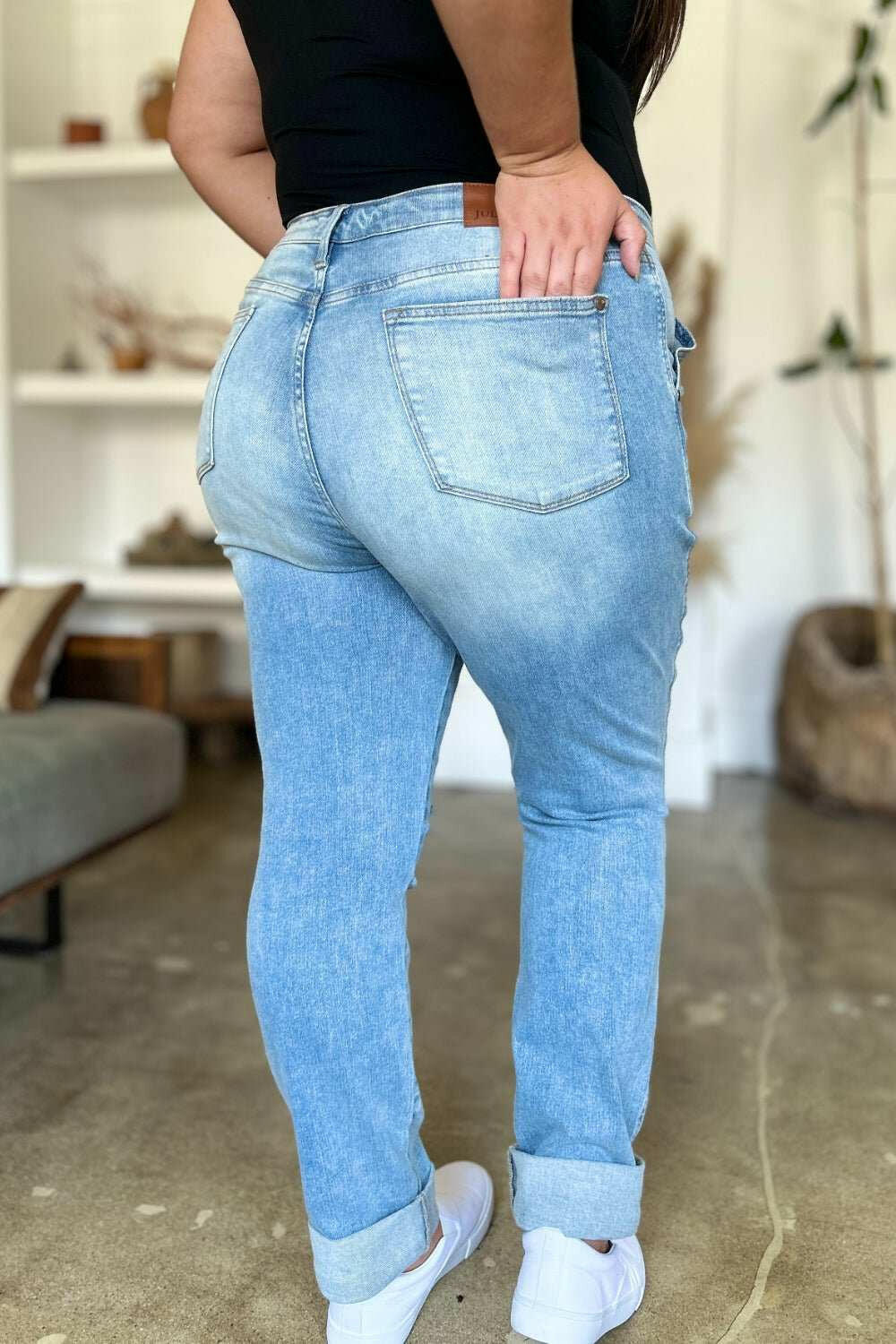 Judy Blue Distressed Straight Leg Jeans with Patch PocketsThese distressed straight jeans feature stylish patch pockets for added flair. The distressed detailing adds a trendy touch to your look. The straight cut offers a fStraight Leg JeansJudy Blue Distressed