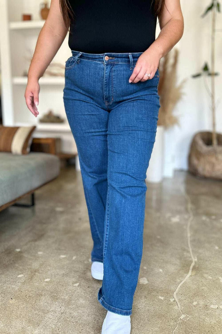 Judy Blue High Rise Straight JeansElevate your wardrobe with these versatile and flattering high rise straight jeans. The high rise fit elongates your legs and accentuates your waist for a timeless, Straight Leg JeansJudy Blue High Rise