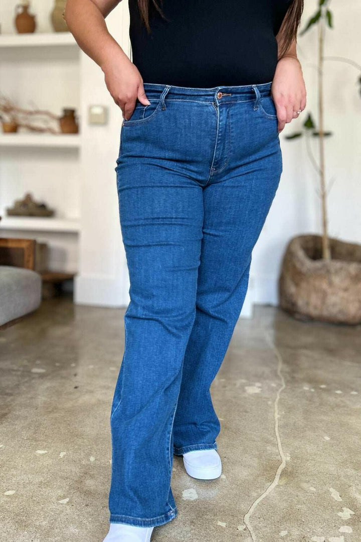 Judy Blue High Rise Straight JeansElevate your wardrobe with these versatile and flattering high rise straight jeans. The high rise fit elongates your legs and accentuates your waist for a timeless, Straight Leg JeansJudy Blue High Rise