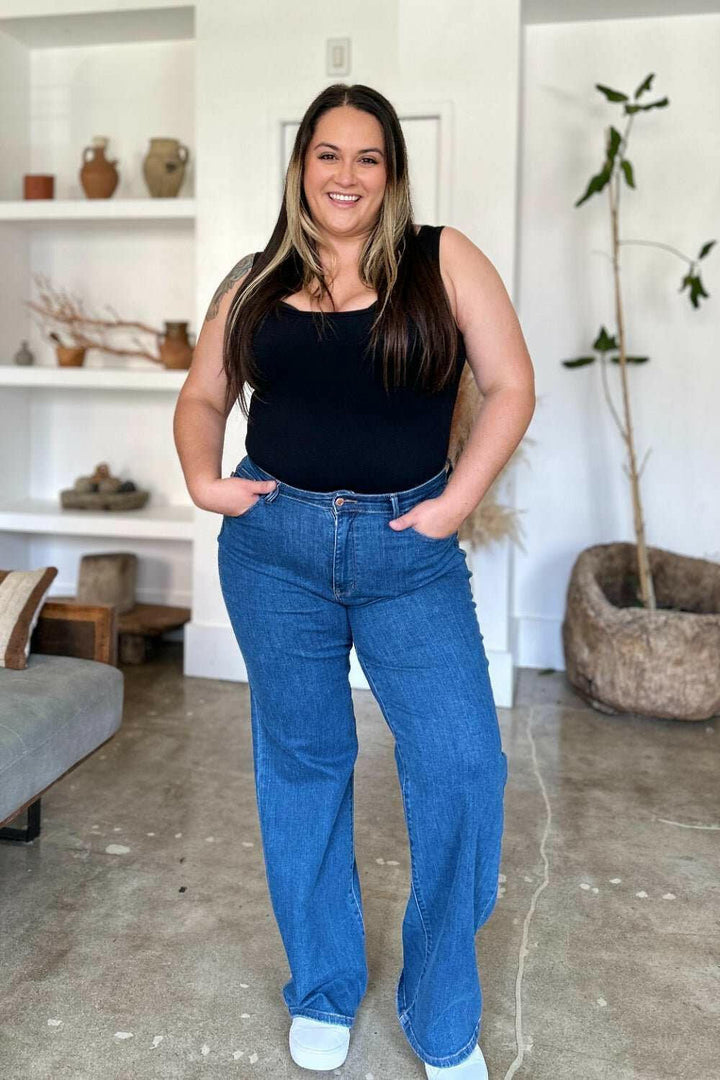Judy Blue High Rise Straight JeansElevate your wardrobe with these versatile and flattering high rise straight jeans. The high rise fit elongates your legs and accentuates your waist for a timeless, Straight Leg JeansJudy Blue High Rise