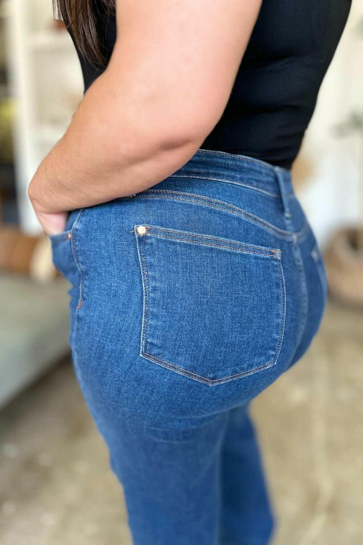 Judy Blue High Rise Straight JeansElevate your wardrobe with these versatile and flattering high rise straight jeans. The high rise fit elongates your legs and accentuates your waist for a timeless, Straight Leg JeansJudy Blue High Rise