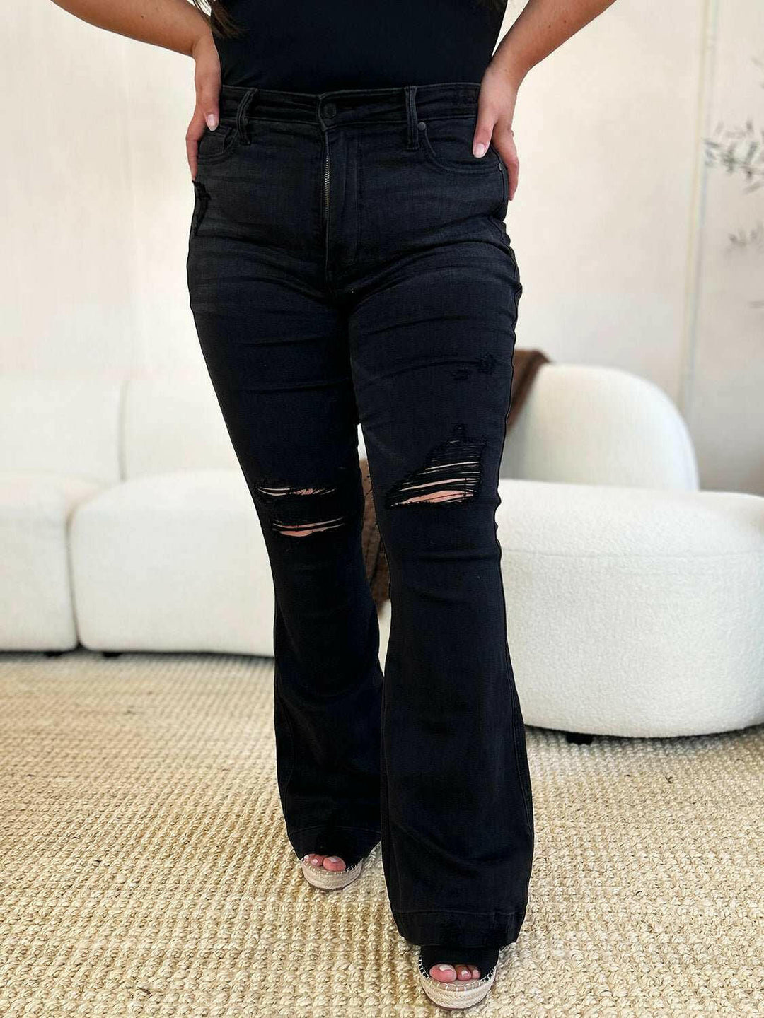 Judy Blue High Waist Distressed Flare JeansAdd a touch of retro to your look with the trendy Judy Blue High Waist Distressed Flare Jeans. The high waist design flatters your silhouette, while the distressed dFlare JeansJudy Blue High Waist