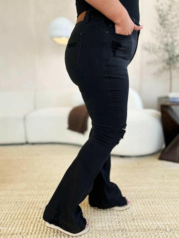 Judy Blue High Waist Distressed Flare JeansAdd a touch of retro to your look with the trendy Judy Blue High Waist Distressed Flare Jeans. The high waist design flatters your silhouette, while the distressed dFlare JeansJudy Blue High Waist