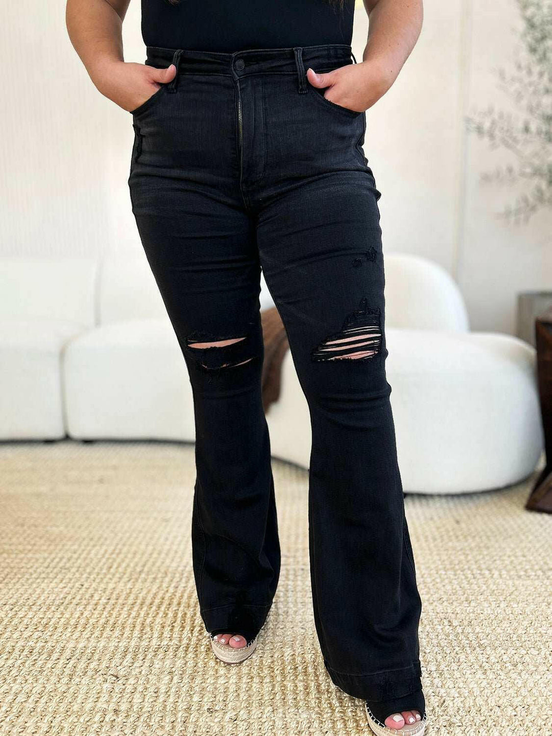 Judy Blue High Waist Distressed Flare JeansAdd a touch of retro to your look with the trendy Judy Blue High Waist Distressed Flare Jeans. The high waist design flatters your silhouette, while the distressed dFlare JeansJudy Blue High Waist