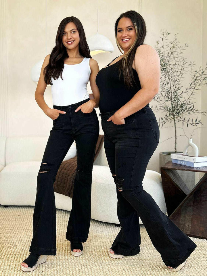 Judy Blue High Waist Distressed Flare JeansAdd a touch of retro to your look with the trendy Judy Blue High Waist Distressed Flare Jeans. The high waist design flatters your silhouette, while the distressed dFlare JeansJudy Blue High Waist