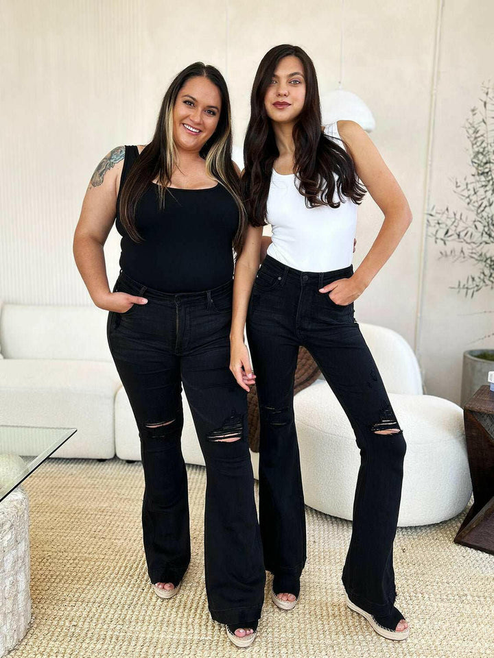 Judy Blue High Waist Distressed Flare JeansAdd a touch of retro to your look with the trendy Judy Blue High Waist Distressed Flare Jeans. The high waist design flatters your silhouette, while the distressed dFlare JeansJudy Blue High Waist