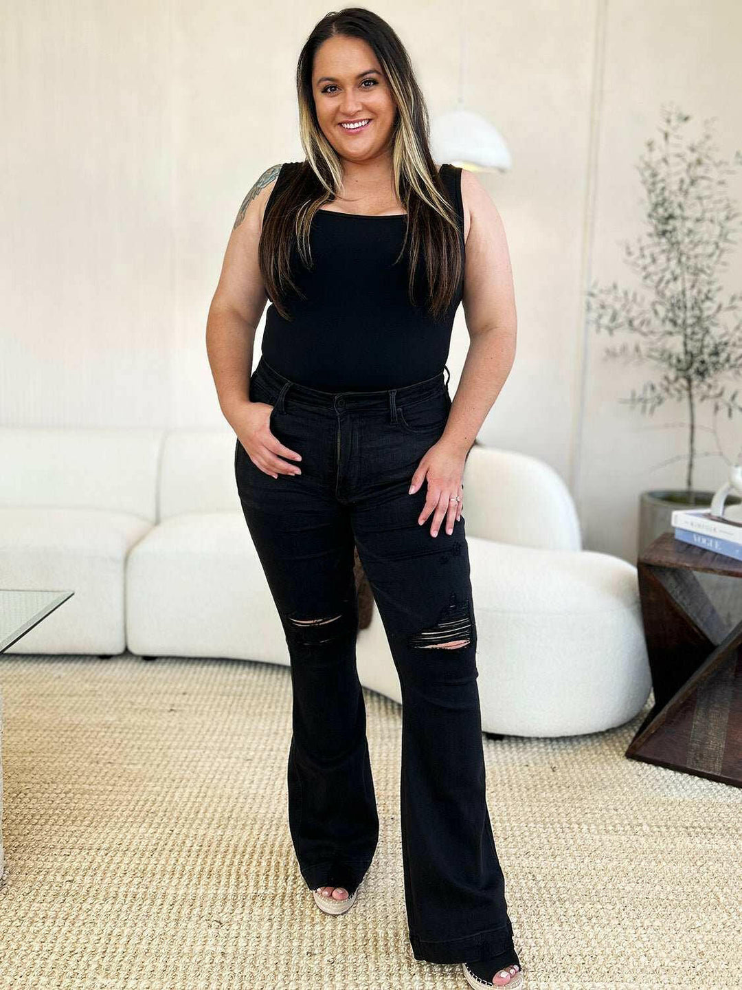 Judy Blue High Waist Distressed Flare JeansAdd a touch of retro to your look with the trendy Judy Blue High Waist Distressed Flare Jeans. The high waist design flatters your silhouette, while the distressed dFlare JeansJudy Blue High Waist