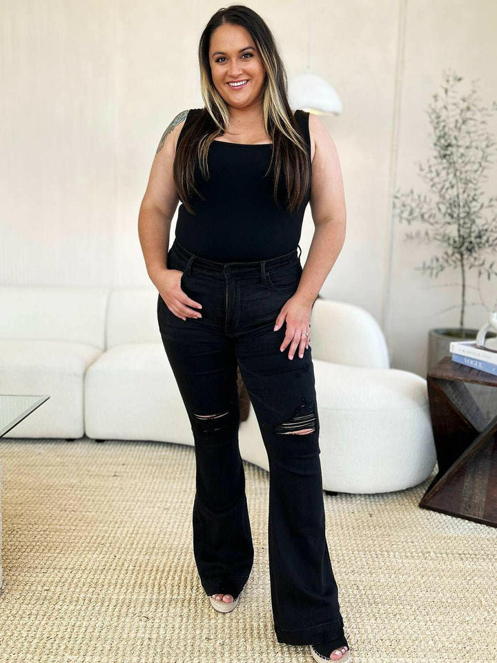 Judy Blue High Waist Distressed Flare JeansAdd a touch of retro to your look with the trendy Judy Blue High Waist Distressed Flare Jeans. The high waist design flatters your silhouette, while the distressed dFlare JeansJudy Blue High Waist