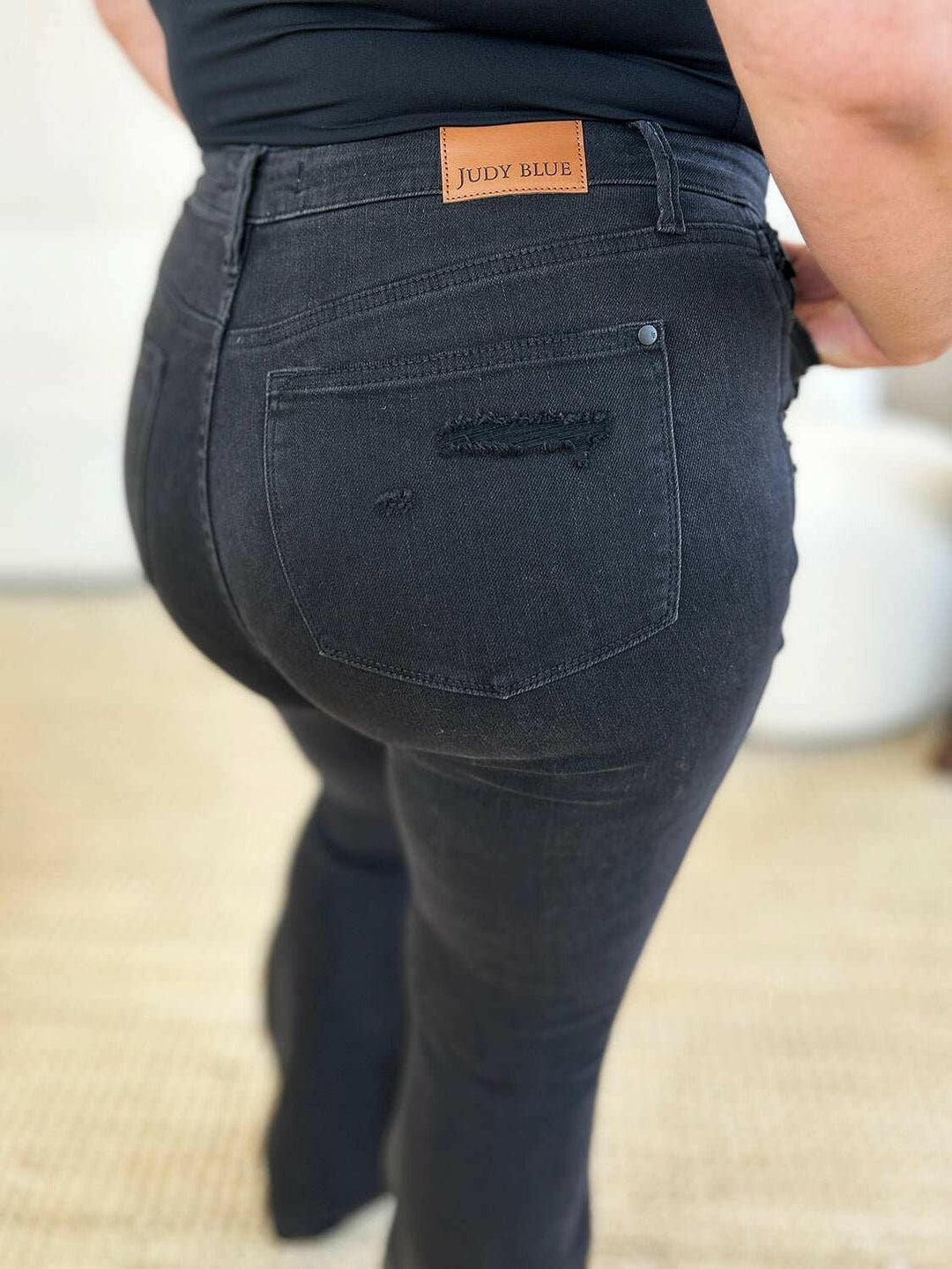 Judy Blue High Waist Distressed Flare JeansAdd a touch of retro to your look with the trendy Judy Blue High Waist Distressed Flare Jeans. The high waist design flatters your silhouette, while the distressed dFlare JeansJudy Blue High Waist