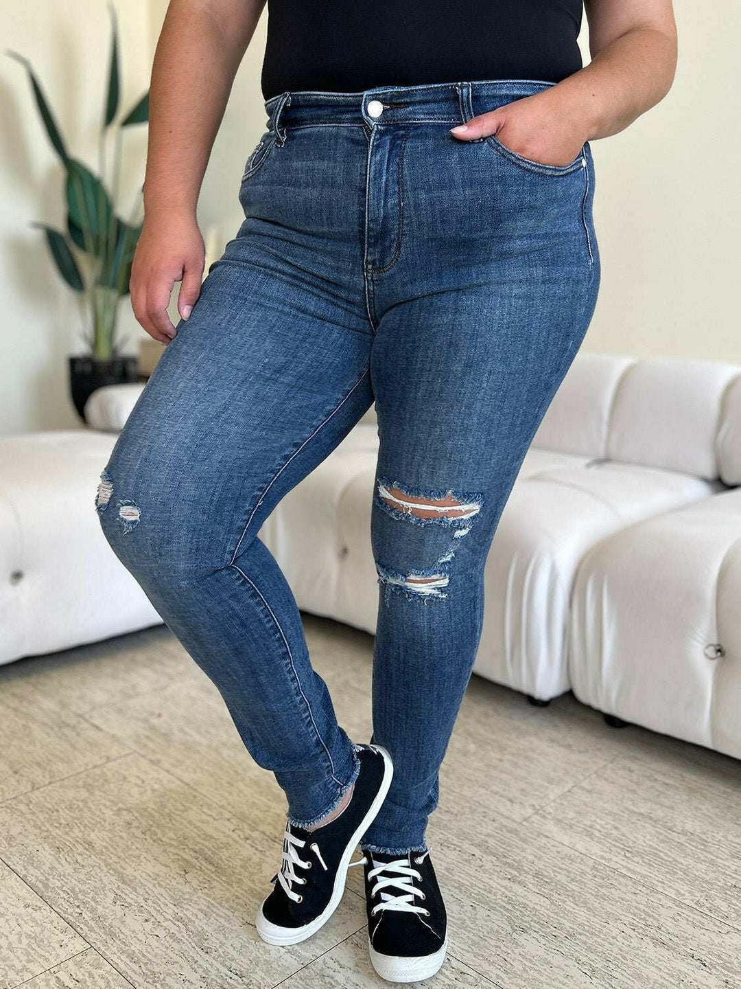 Judy Blue High Waist Distressed Skinny JeansGet the perfect fit with these versatile high waist distressed skinny jeans. Made from stretchy denim, they offer all-day comfort and a flattering silhouette. PerfecSkinny JeansJudy Blue High Waist