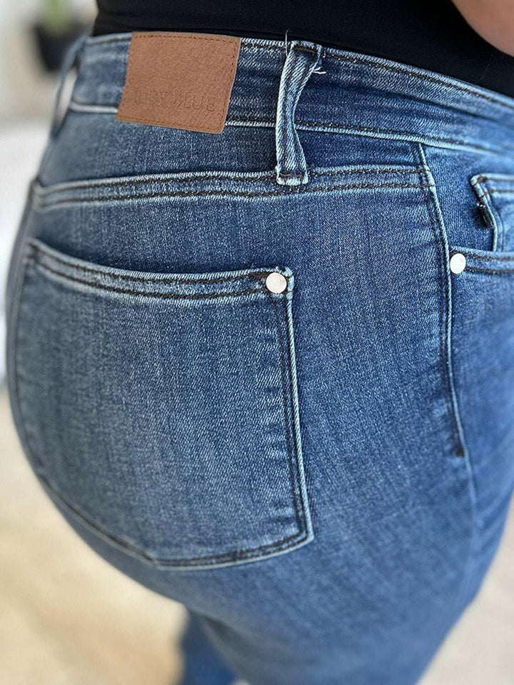 Judy Blue High Waist Distressed Skinny JeansGet the perfect fit with these versatile high waist distressed skinny jeans. Made from stretchy denim, they offer all-day comfort and a flattering silhouette. PerfecSkinny JeansJudy Blue High Waist