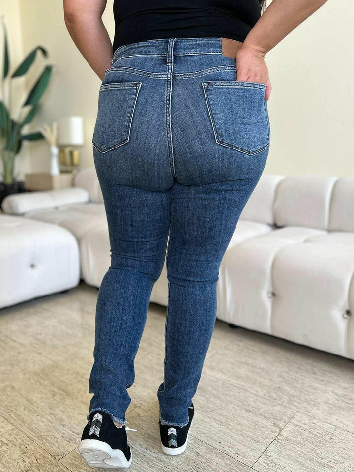 Judy Blue High Waist Distressed Skinny JeansGet the perfect fit with these versatile high waist distressed skinny jeans. Made from stretchy denim, they offer all-day comfort and a flattering silhouette. PerfecSkinny JeansJudy Blue High Waist