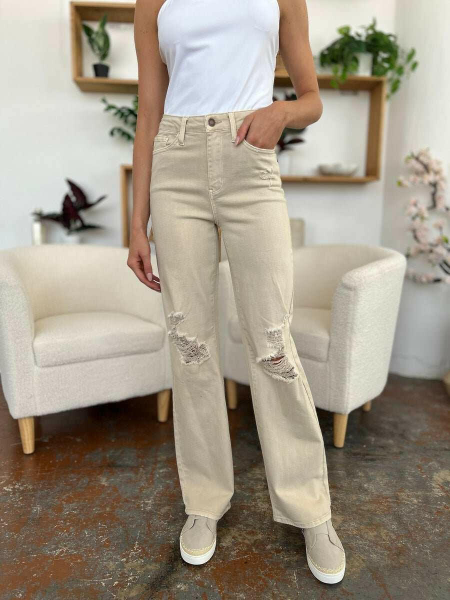 Judy Blue High Waist Distressed Wide Leg JeansStep up your denim game with our High Waist Distressed Wide Leg Jeans. These stylish and durable jeans feature a flattering and versatile wide leg silhouette and on-Wide Leg JeansJudy Blue High Waist