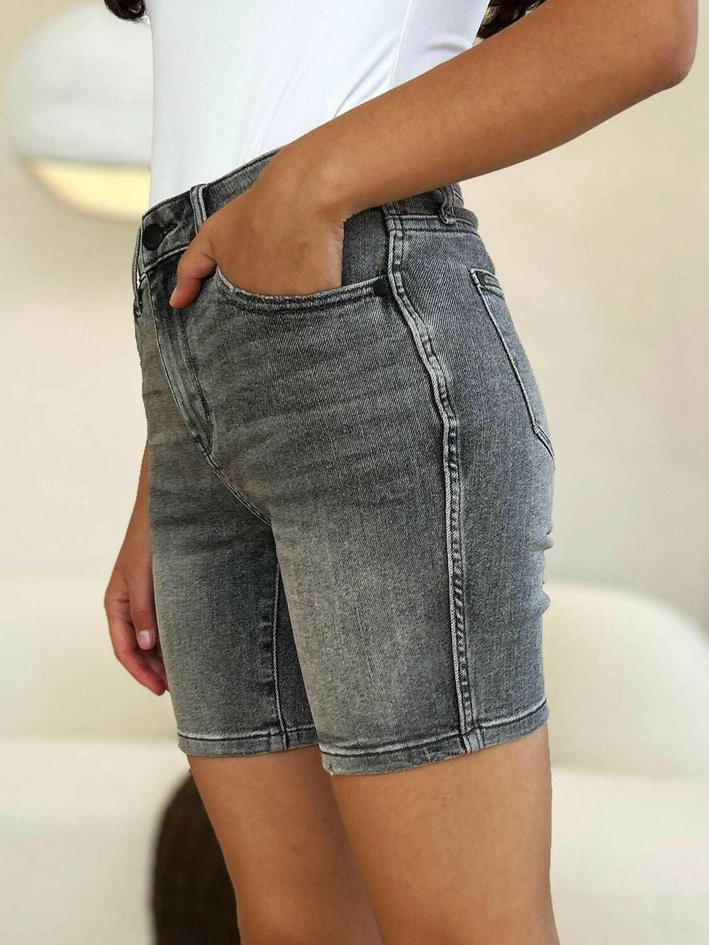 Judy Blue High Waist Washed Denim ShortsExperience unparalleled style with the Judy Blue High Waist Washed Denim Shorts, designed exclusively for those who value timeless fashion and modern comfort. These Jean ShortsJudy Blue High Waist