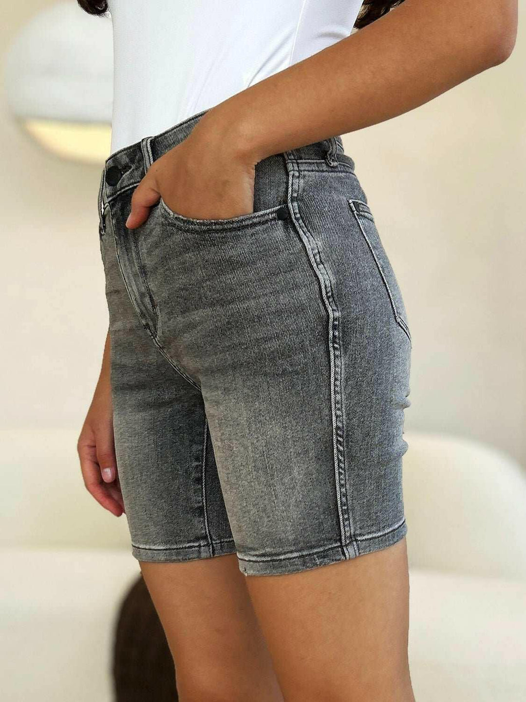 Judy Blue High Waist Washed Denim ShortsExperience unparalleled style with the Judy Blue High Waist Washed Denim Shorts, designed exclusively for those who value timeless fashion and modern comfort. These Jean ShortsJudy Blue High Waist