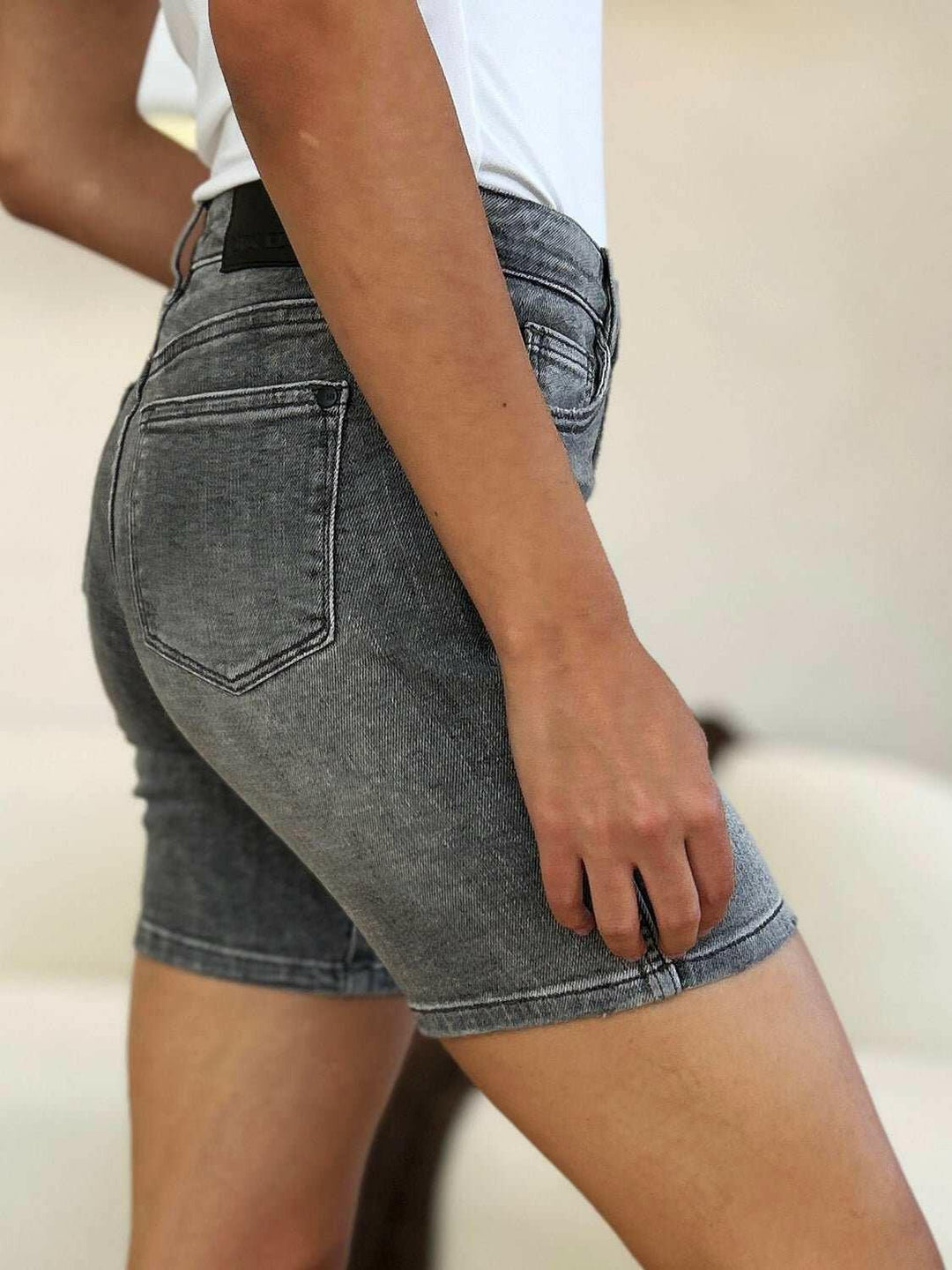 Judy Blue High Waist Washed Denim ShortsExperience unparalleled style with the Judy Blue High Waist Washed Denim Shorts, designed exclusively for those who value timeless fashion and modern comfort. These Jean ShortsJudy Blue High Waist