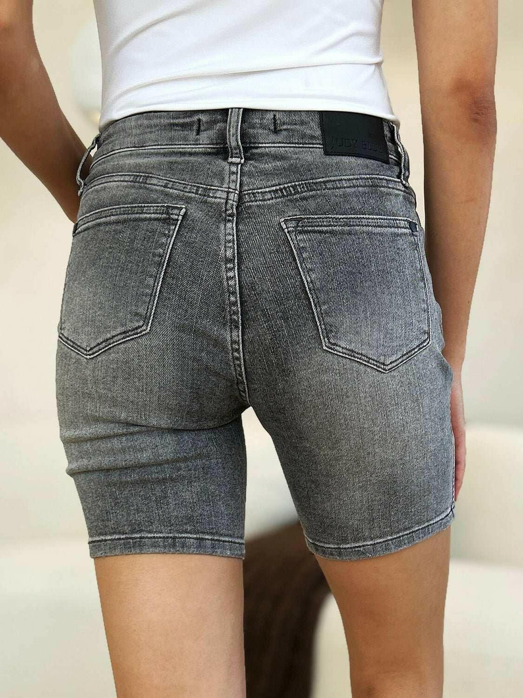 Judy Blue High Waist Washed Denim ShortsExperience unparalleled style with the Judy Blue High Waist Washed Denim Shorts, designed exclusively for those who value timeless fashion and modern comfort. These Jean ShortsJudy Blue High Waist