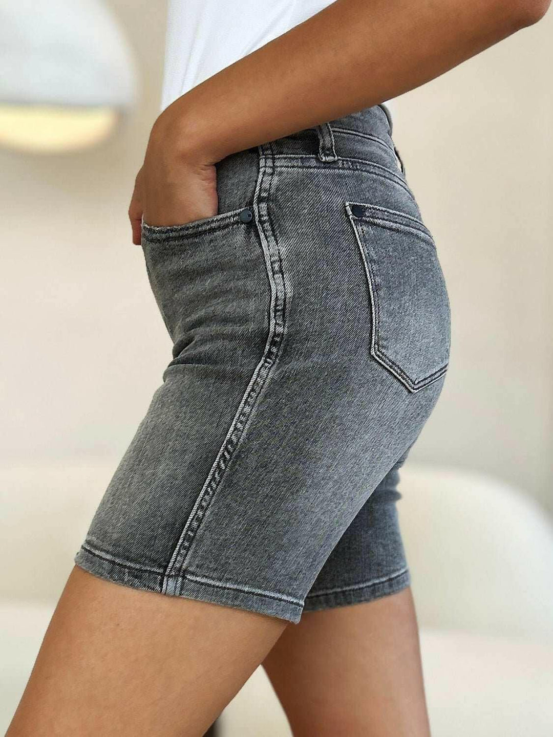 Judy Blue High Waist Washed Denim ShortsExperience unparalleled style with the Judy Blue High Waist Washed Denim Shorts, designed exclusively for those who value timeless fashion and modern comfort. These Jean ShortsJudy Blue High Waist