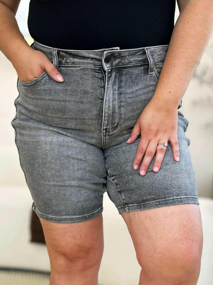 Judy Blue High Waist Washed Denim ShortsExperience unparalleled style with the Judy Blue High Waist Washed Denim Shorts, designed exclusively for those who value timeless fashion and modern comfort. These Jean ShortsJudy Blue High Waist