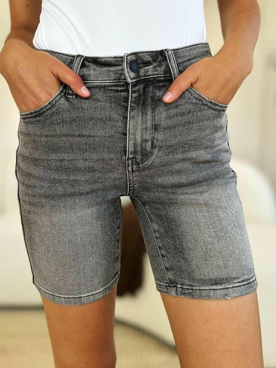 Judy Blue High Waist Washed Denim ShortsExperience unparalleled style with the Judy Blue High Waist Washed Denim Shorts, designed exclusively for those who value timeless fashion and modern comfort. These Jean ShortsJudy Blue High Waist