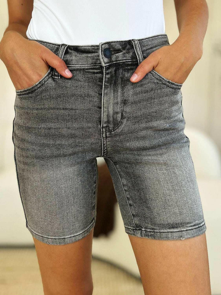 Judy Blue High Waist Washed Denim ShortsExperience unparalleled style with the Judy Blue High Waist Washed Denim Shorts, designed exclusively for those who value timeless fashion and modern comfort. These Jean ShortsJudy Blue High Waist