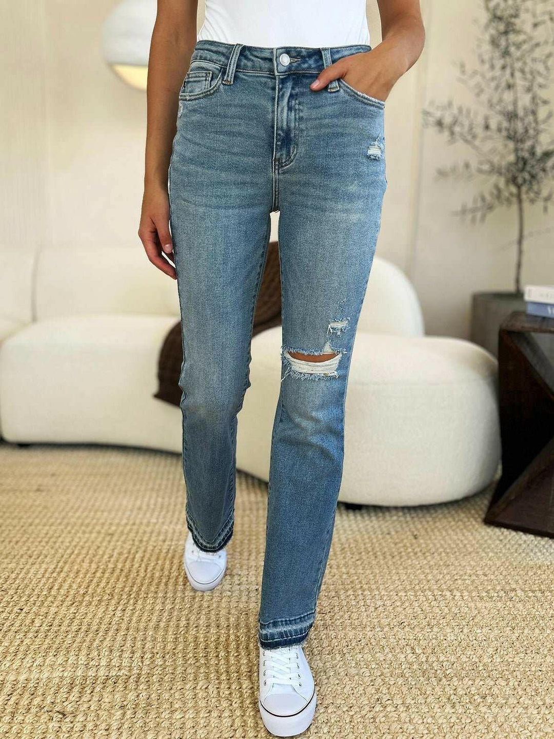 Judy Blue Mid Rise Destroyed Hem Distressed JeansExperience unparalleled style with the Judy Blue Mid Rise Destroyed Hem Distressed Jeans, designed exclusively for those who dare to stand out. These flare jeans empFlare JeansJudy Blue Mid Rise
